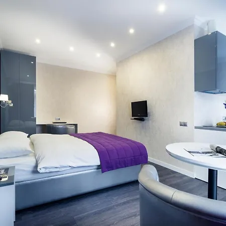 Status Aparthotel